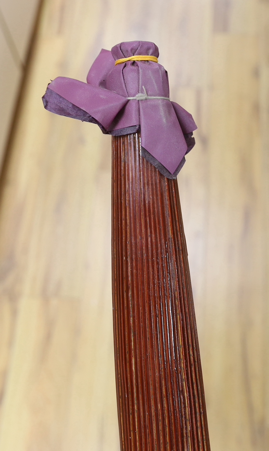 A Japanese parasol with purple/yellow fabric lining, 74cm long